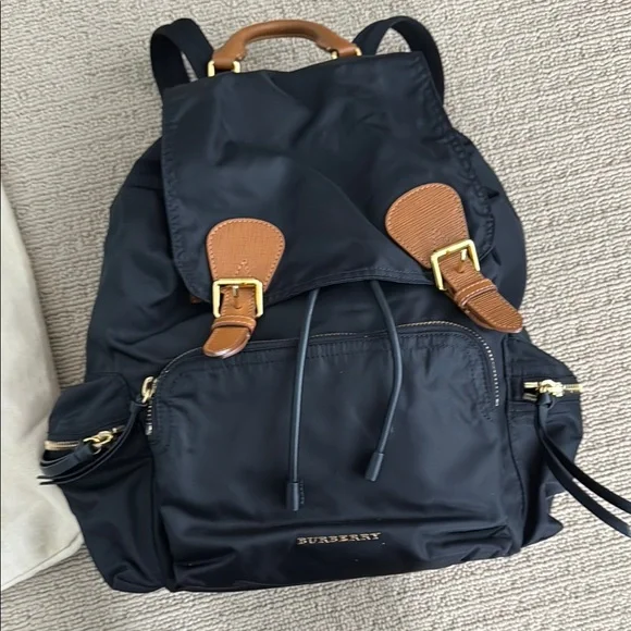 Burberry | Bags | Burberry Black And Tan Backpack With Gold  display picture 1